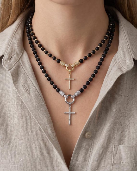 Exquisite gemstone pearl necklace with a sparkling cross pendant made of zirconia and elegant gemstone spacer beads.
