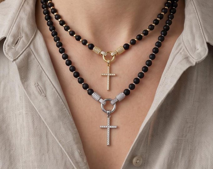 Exquisite gemstone pearl necklace with a sparkling cross pendant made of zirconia and elegant gemstone spacer beads.