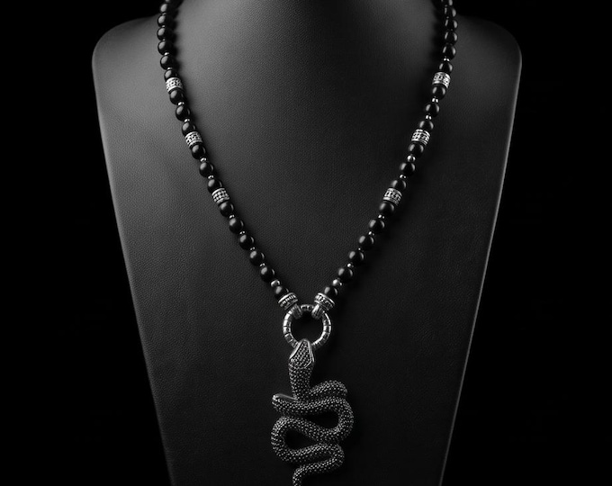 Elegant women's necklace made of onyx with a sparkling snake