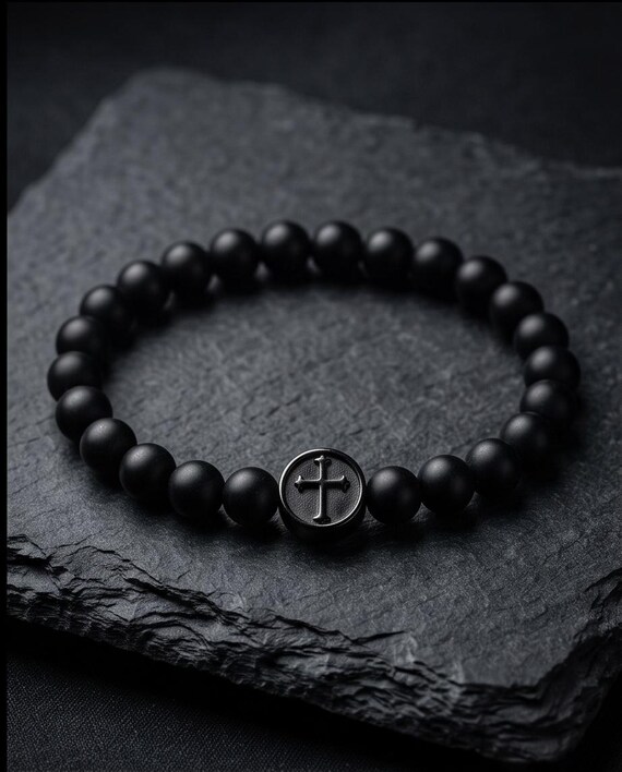 Elegant pearl bracelet with cross symbol