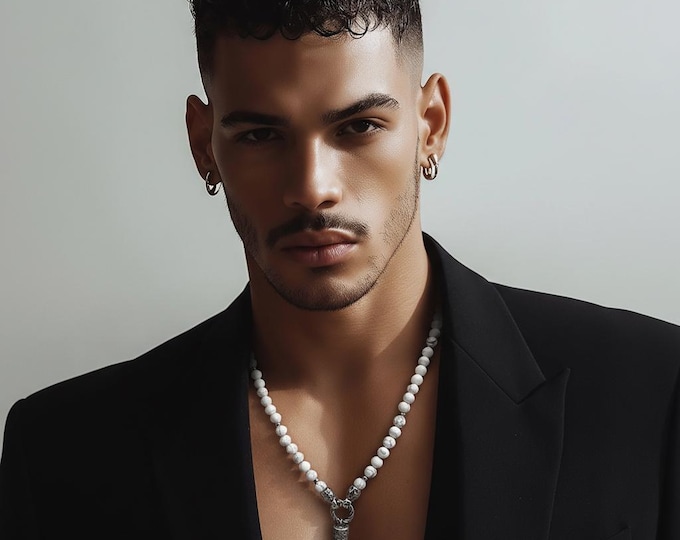 Unisex pearl necklace made of white howlite or black onyx and wolf tooth stainless steel pendant