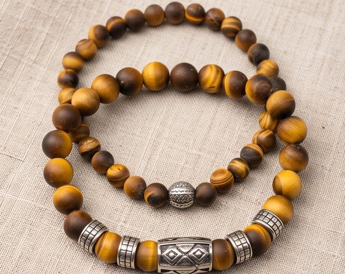 Tiger's eye beaded bracelet set with stainless steel elements and a selection of stones
