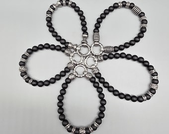 Bracelet with stainless steel elements, available in onyx, lava stone or howlite – Unisex