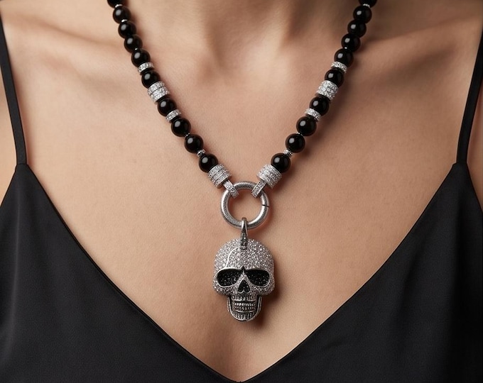 Elegant women's necklace made of onyx with skull, cubic zirconia and stainless steel