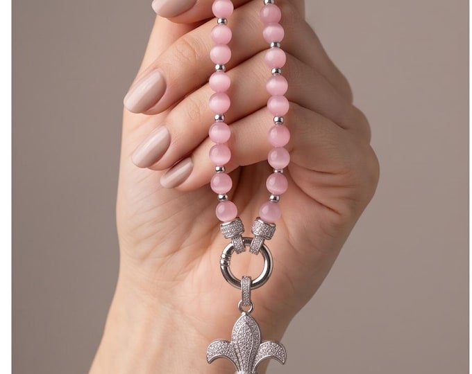 Elegant necklace made of pink moonstone with a stainless steel lily pendant