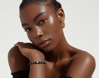 Beaded bracelet made of black onyx stone and stainless steel elements