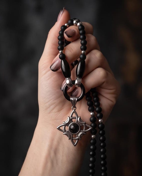 Elegant handmade women's necklace made of black onyx