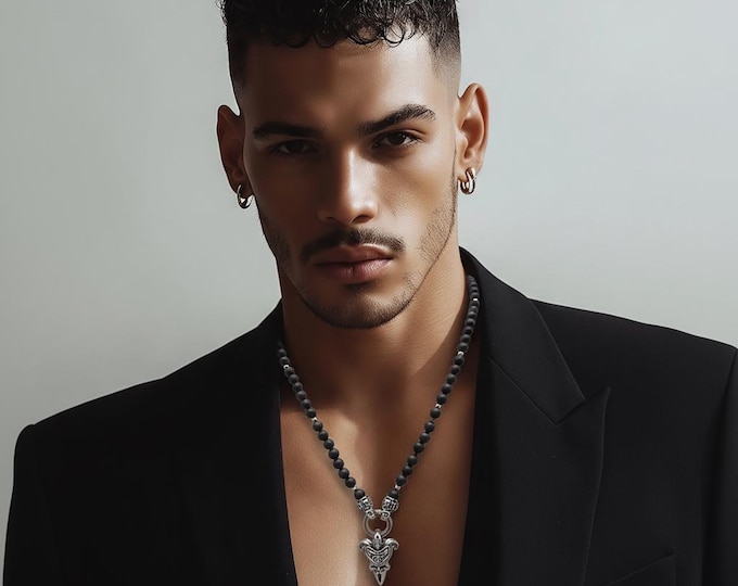 Black onyx bead necklace with stainless steel elements and skull pendant