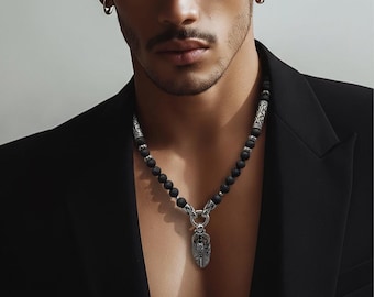 Unisex pearl necklace made of lava stone and skull pendant made of stainless steel