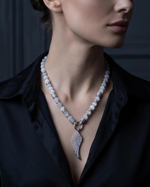 Moonstone pearl necklace with delicate stainless steel wing