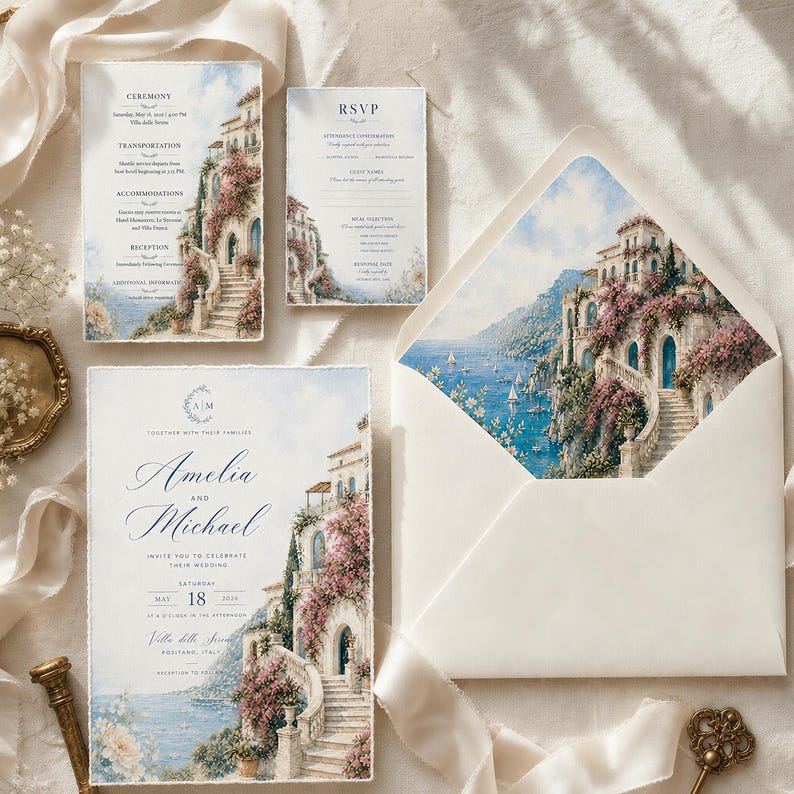 May include: A wedding stationery set featuring a watercolor illustration of a coastal Italian villa with pink flowers, blue sea, and stone stairs. Includes a main invitation for Amelia and Michael, an RSVP card, and an envelope with a matching liner.