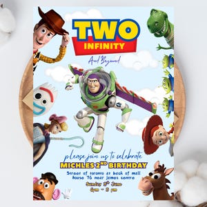 May include: A blue Toy Story themed birthday invitation. The invitation features the text "TWO INFINITY And Beyond" and "MICHLES 2ND BIRTHDAY". The invitation also includes the date, time, and location of the party in Toronto, Canada.