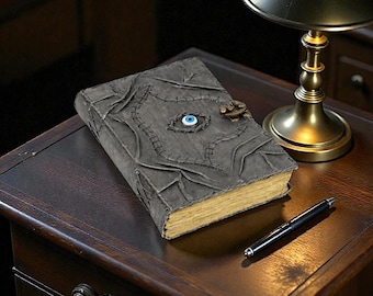 Grimorio de cuero hecho a mano: Libro de hechizos con ojos en relieve, diario pagano