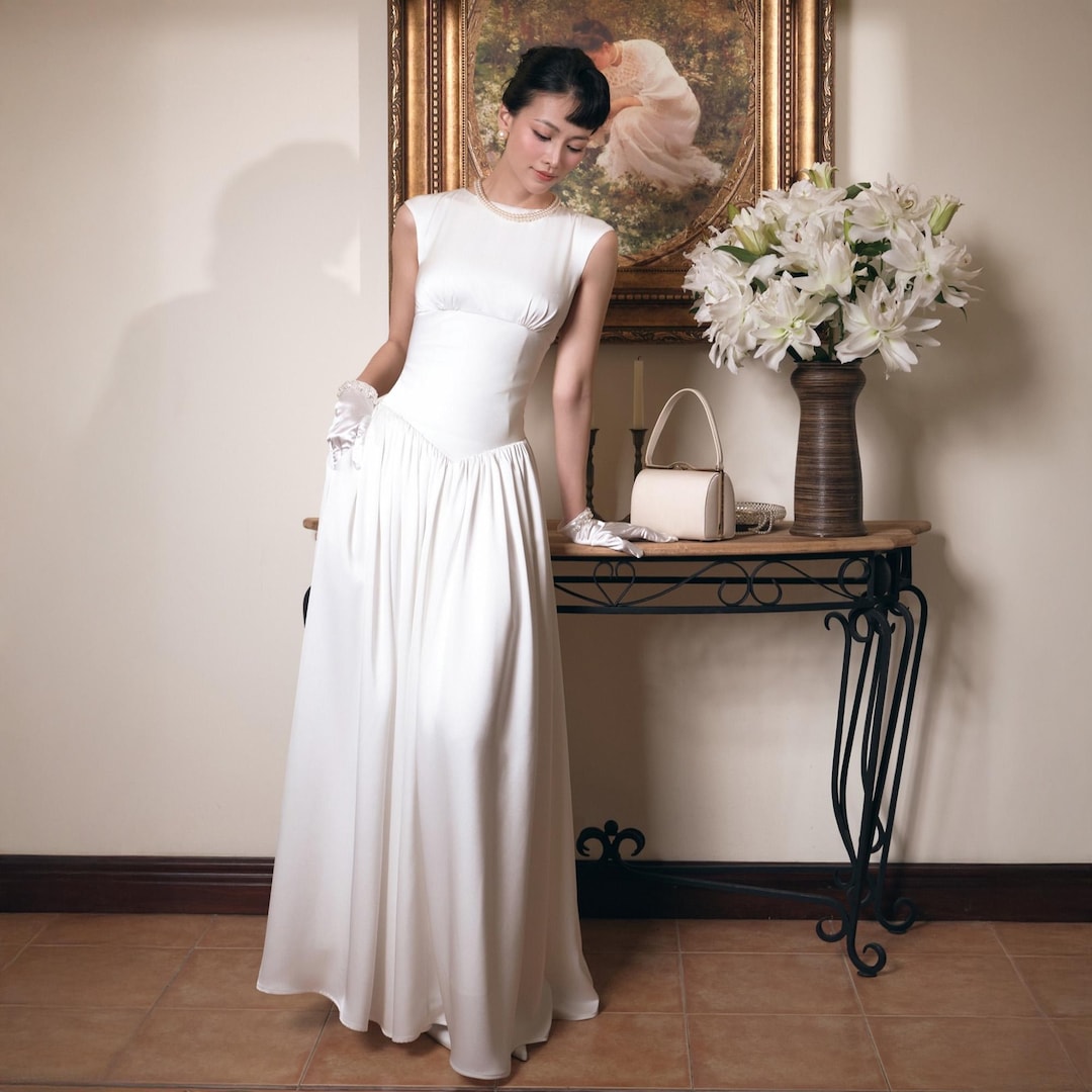 simple silk wedding dress Satin Mermaid Backless Spaghetti Straps Dresses, MW602 This ivory silk wedding dress is adorned with a knot detail at the front and features an open back Silk Wedding Dress Vintage Minimalist