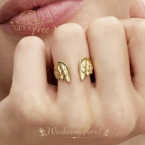 May include: A set of three ceramic mugs with a speckled, matte finish. The mugs are in shades of cream, light gray, and dark gray. Each mug has a simple, minimalist design, perfect for coffee or tea.