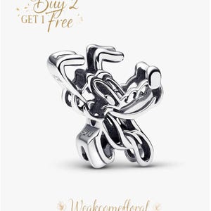 May include: A silver charm depicting a cartoon character with detailed features and a shiny finish. The image includes the text "Buy 2 Get 1 Free" and "Weakcomefloral".