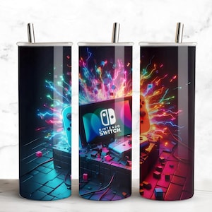 May include: Three stainless steel tumblers with a vibrant design featuring a Nintendo Switch console and controllers. The design incorporates neon colors and the Nintendo Switch logo. Each tumbler has a silver straw.
