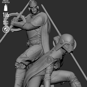 May include: A grayscale 1/6 scale resin and FDM figure of two characters in futuristic armor, one holding a circular weapon and the other kneeling. The figure is tested and presupported.