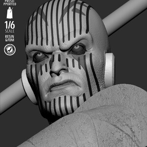 May include: A grayscale bust of a character with a stern expression. The figure has black vertical stripes on the head and face. The text "TESTED PRESUPPORTED", "1/6 SCALE", and "RESIN & FDM" are visible.