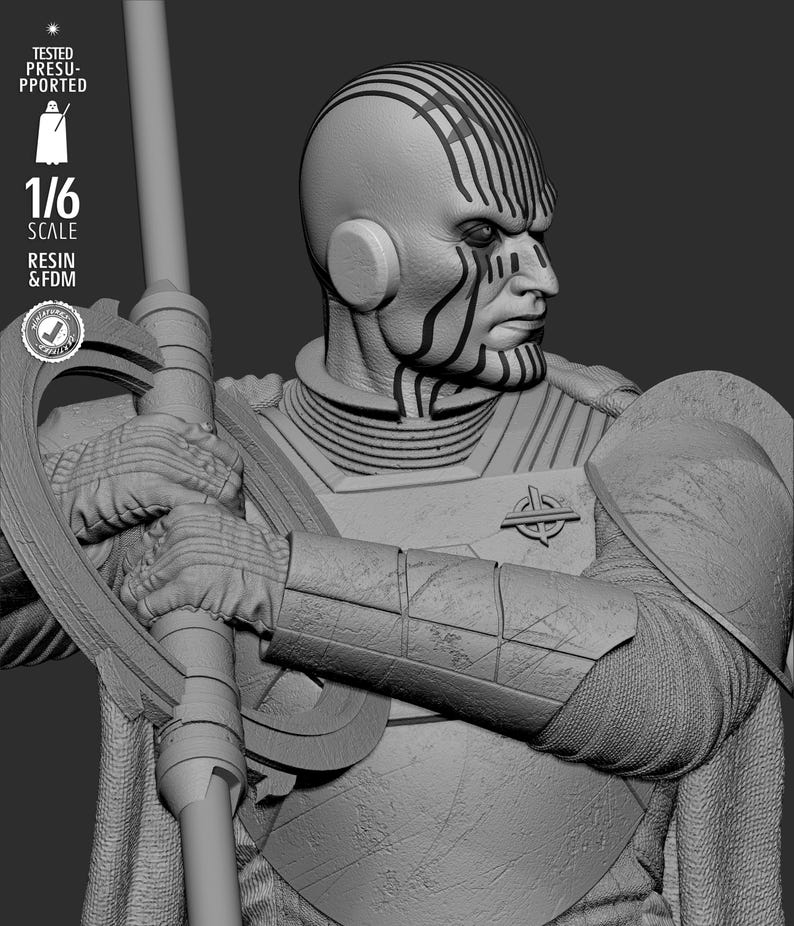 May include: A detailed grayscale sculpture of a humanoid figure with distinctive facial markings and a stern expression. The figure is holding a staff-like weapon and is clad in armor. The image includes text indicating a 1/6 scale and resin/FDM construction.