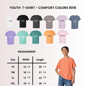 May include: A selection of youth t-shirts in colours such as white, black, and blue jean. The image includes a size chart with measurements in inches for width and length. A young person is wearing an orange t-shirt.