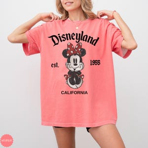 May include: A set of three ceramic mugs with a speckled, matte finish. The mugs are in shades of cream, light gray, and dark gray. Each mug has a simple, minimalist design, perfect for coffee or tea.