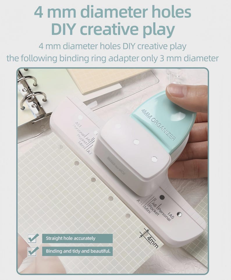 May include: A white and mint green paper hole punch with the text "4MM ORGANIZER". The image also shows a grid-patterned paper with pre-punched holes and the text "4 mm diameter holes DIY creative play".