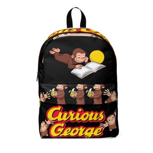 May include: Black Curious George backpack with illustrations of the monkey reading and holding bananas. The words "Curious George" are in yellow and red. The backpack has a black handle and straps.