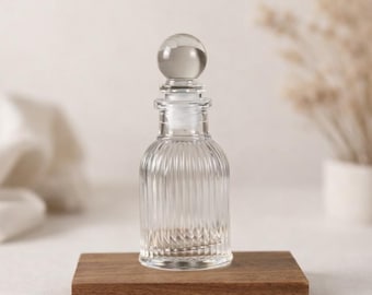 Confezione da 10 bottigliette di vetro a tenuta stagna da 50 ml.