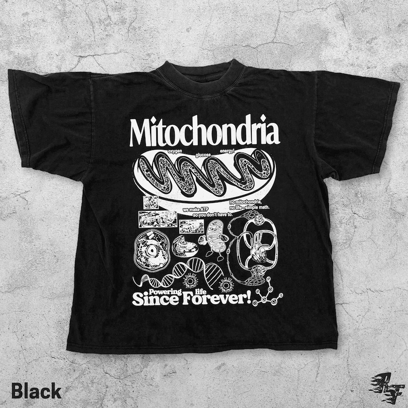 May include: Black t-shirt with a white graphic design featuring the word "Mitochondria" and related scientific illustrations. The design includes text that reads "Powering life Since Forever!"