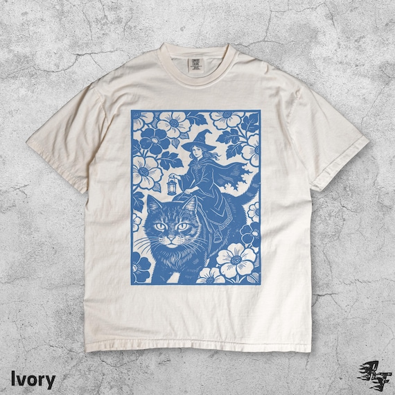Witch Cat Rider Floral T-Shirt, Retro Fantasy Graphic Tee, Magical Lantern Artwork Shirt, Vintage Flowers Design, Unique Sorceress Gift