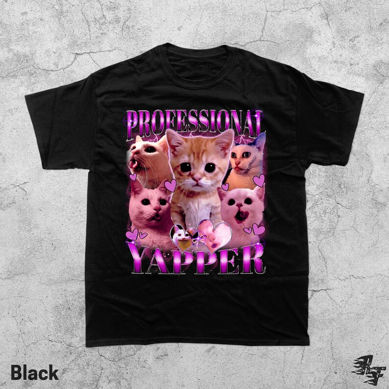 May include: Black t-shirt featuring a graphic of several cats with the text "PROFESSIONAL YAPPER" in a pink and purple font. The cats are in various poses, with hearts around them.