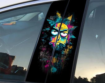 Op de afbeelding: Autoraamsticker met een kleurrijke cartoonfiguur. Het personage heeft een gele kop, een blauwe mond en roze ogen, tegen een zwarte achtergrond met kleurrijke verfspatten.
