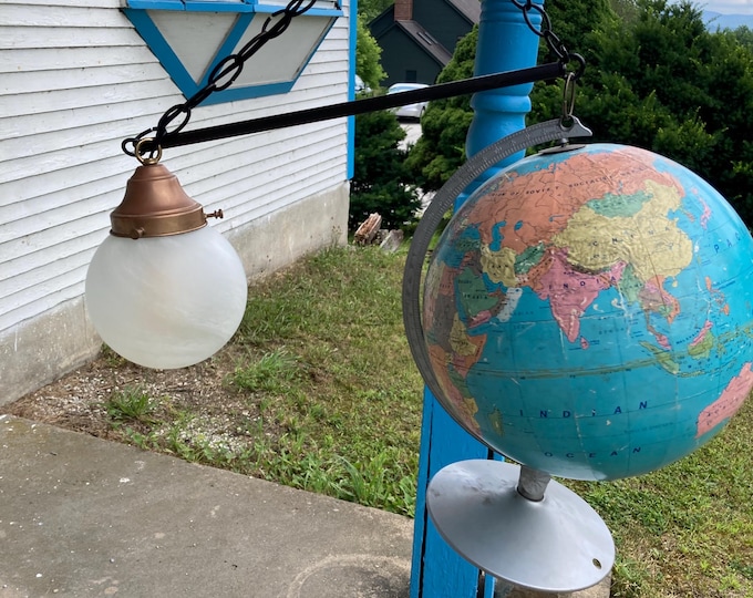 The World with the sun/moon plug in hanging light.