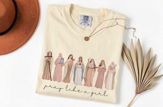 Comfort Colors® Catholic Saint Shirt, Pray Like A Girl Christian, Gift for Women, Faith Inspired Tee, Church Clothing Tee
