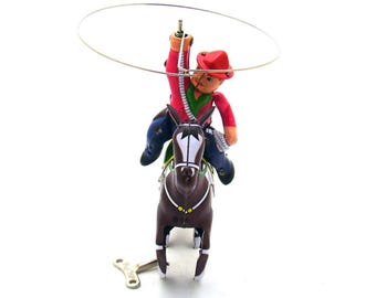 Vintage Tin Wind-Up Cowboy on Horse with Lasso