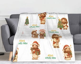Baby Jesus LOVES you Blanket, a warm flannel blanket with a Jesus cartoon print