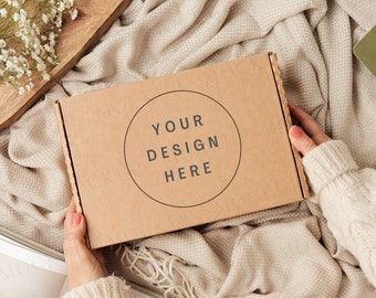 Gift box packaging mockup with hands. Kraft brown postage box mockup.