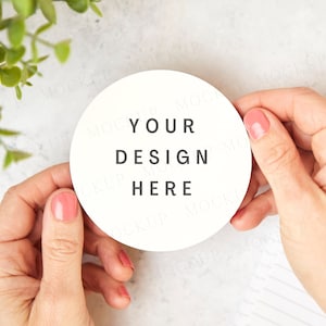 May include: A white round sticker with the text "Your Design Here" in black lettering.