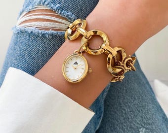 Orologio da polso con piccolo quadrante in cristallo, regalo per lei. Orologio con bracciale ovale con grazioso ciondolo, orologio da donna con quadrante ovale minimalista.