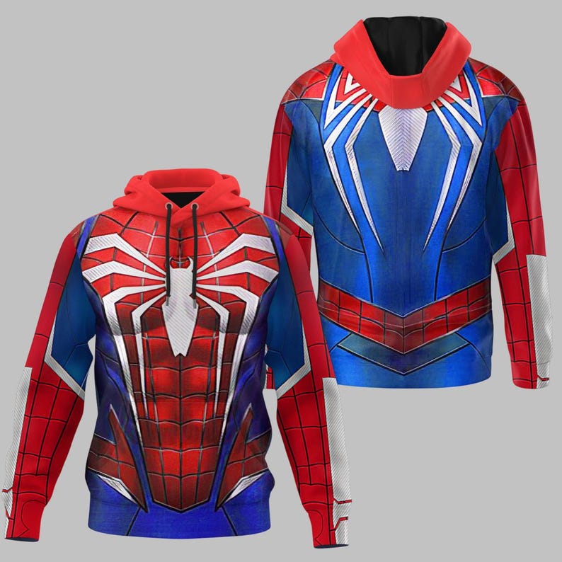 May include: A red, blue, and white hooded sweatshirt featuring a Spider-Man design. The front displays a large white spider emblem on a red webbed background. The sleeves are red with white accents. The hood is red with a black interior.