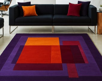Geometrisch handgetuft wollen vloerkleed, paars, roest en oranje