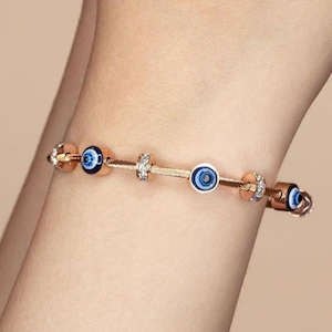 Beautiful Women Bangle bracelet with eyes finish gold plated for gifted and party wedding