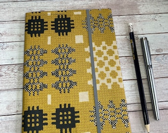 Oilcloth covered A5 notebook Welsh tapestry print mustard oilcloth