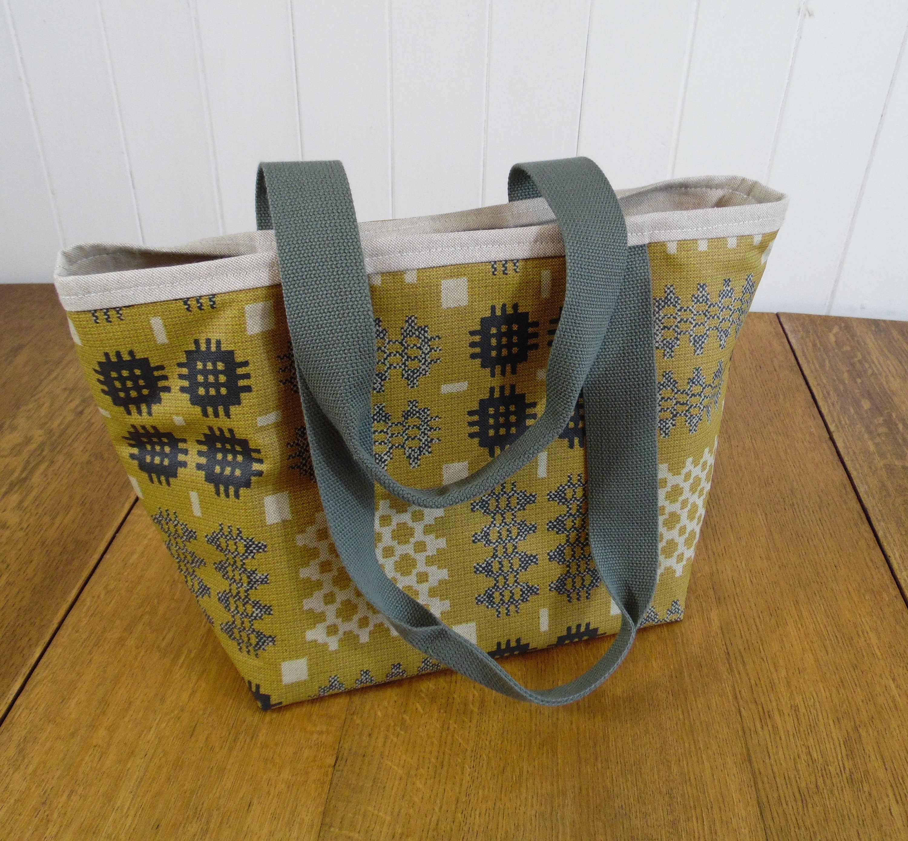 Welsh Blanket Weave Print on a Mustard Background Oilcloth tote bag