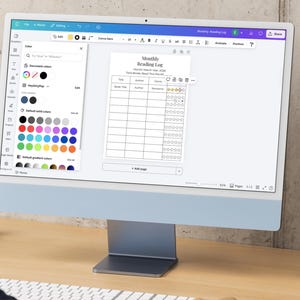 Monthly Reading Log template open inside Canva editor on desktop computer, customizable printable book tracker with editable fonts and colors.