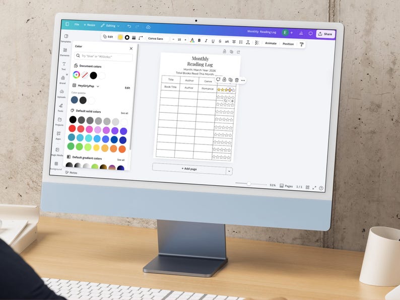 Monthly Reading Log template open inside Canva editor on desktop computer, customizable printable book tracker with editable fonts and colors.