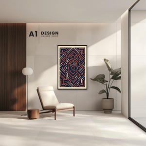 May include: A framed rectangular wall art piece featuring a complex geometric pattern of interlocking lines in dark blue, terracotta orange, and white. The artwork is displayed on a plain wall above a chair, with the text A1 DESIGN ONLINE SHOP.