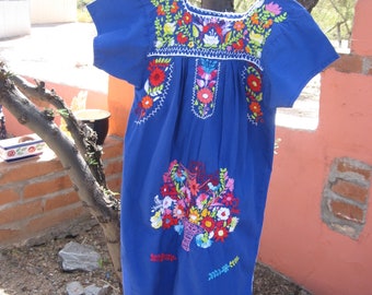 Child's embroidered Mexican peasant dress