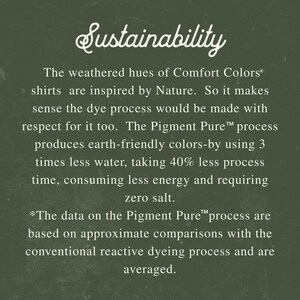 May include: Text on a dark green background reads "Sustainability." The text describes the earth-friendly dye process used for Comfort Colors shirts, including less water, time, energy, and zero salt.